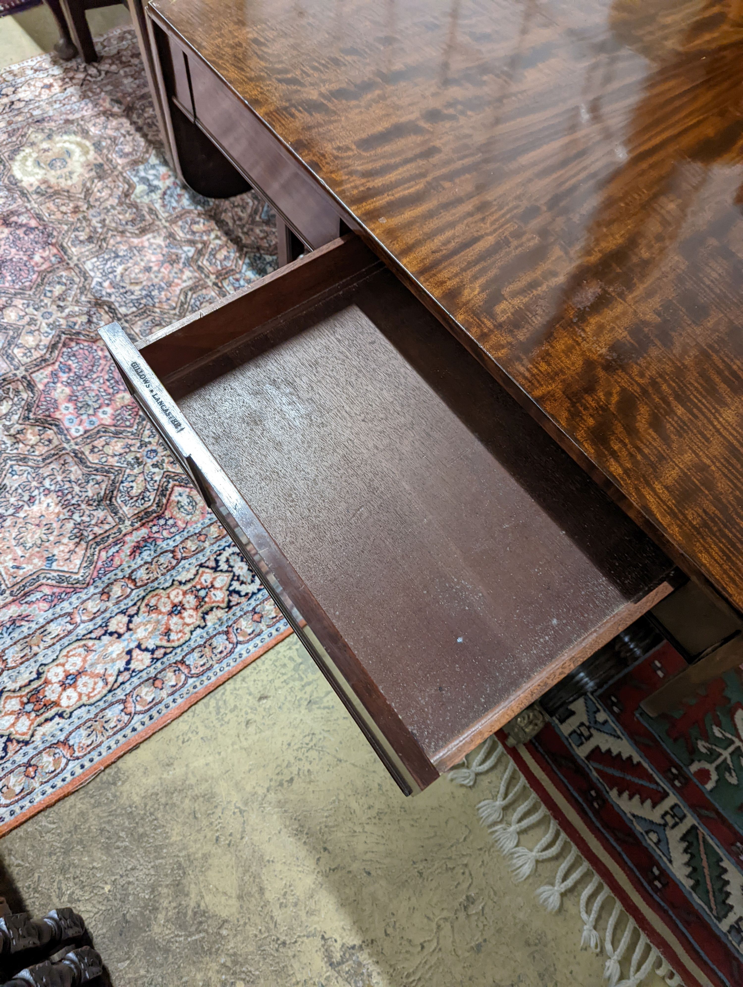 A George IV mahogany sofa table - stamped Gillows Lancaster. W-93cm, D-69cm, H-72cm.